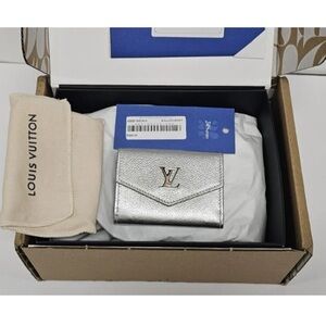 Louis Vuitton Metallic Silver lock mini wallet  NIB authentic